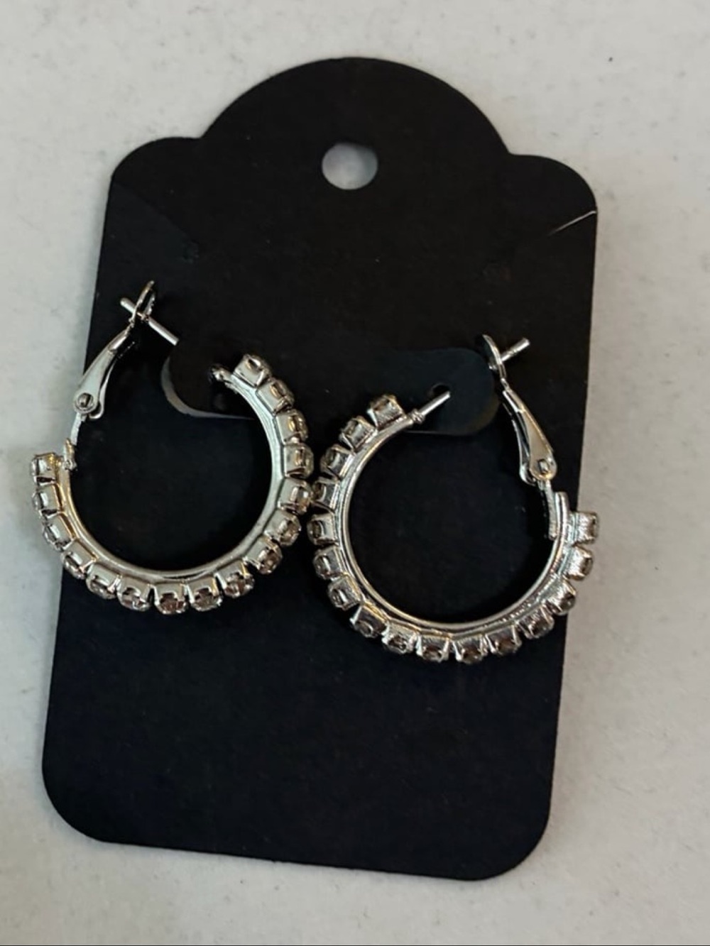 New! Women’s Western Fashion Sparkling Hoop Earrings. Measures 1” x 1”.